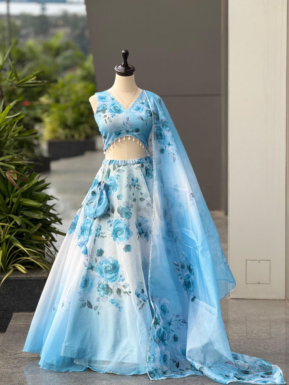 Sky Blue Color Organza Silk Fully Stiched Lehenga Choli With Potali Bag