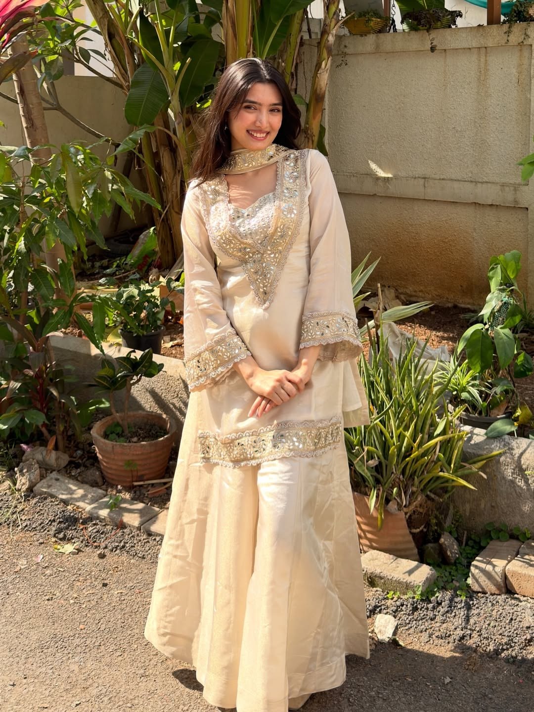 Cream Color Chinon Mirror Moti Work Arti Chaihan Sharara Suit