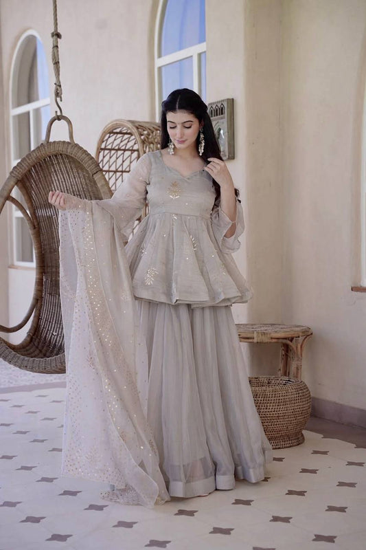 Elevate Your Festive Wardrobe With This Elegant Tabby Silk Palazzo Suit Set, Beautifully Designed With Shimmering Foil Work For A Sophisticated Designer Finish. Featuring A Stylish 30-Inch Designer Top, A Comfortable Tabby Silk Palazzo, And A Matching Foil Work Dupatta, This Luxurious Ensemble Is Perfect For Weddings, Festive Celebrations, Family Gatherings, And Party Wear. 💃✨