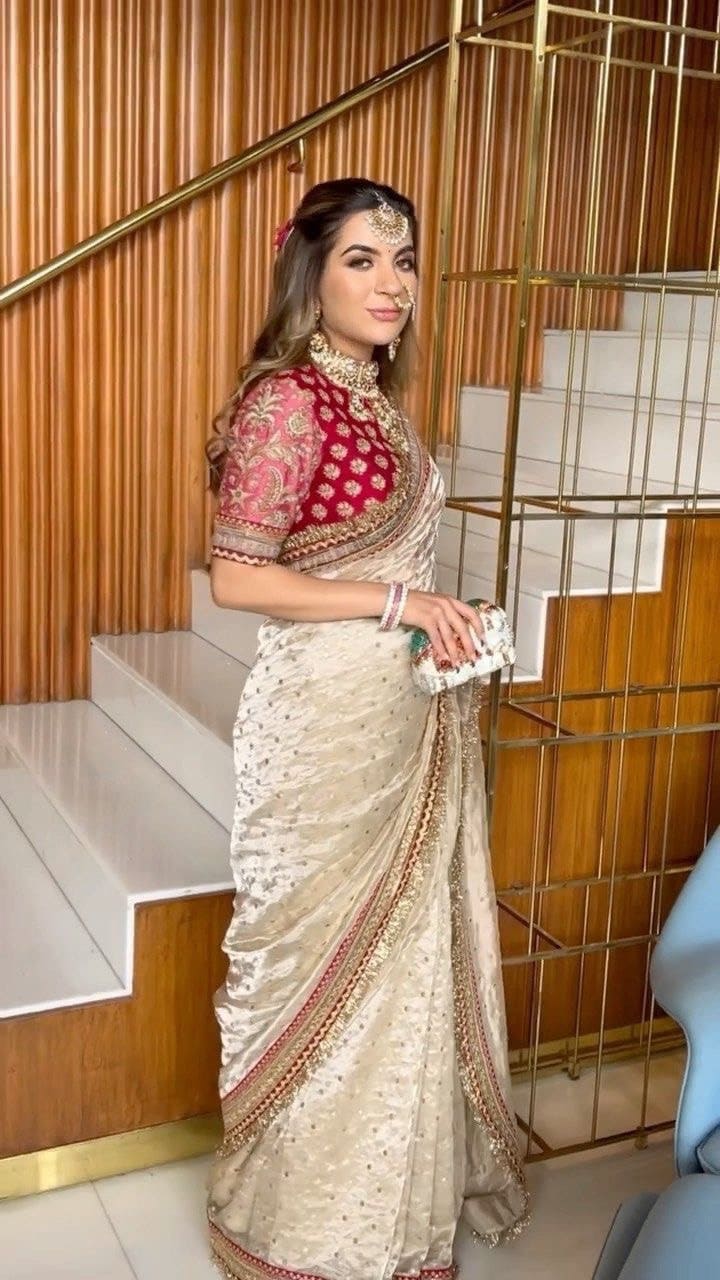Elegant Beige Jimmy Choo Saree With Intricate Sequin Embellishments